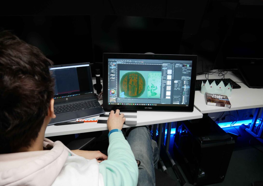 MetStudios student working on a game while at a desk