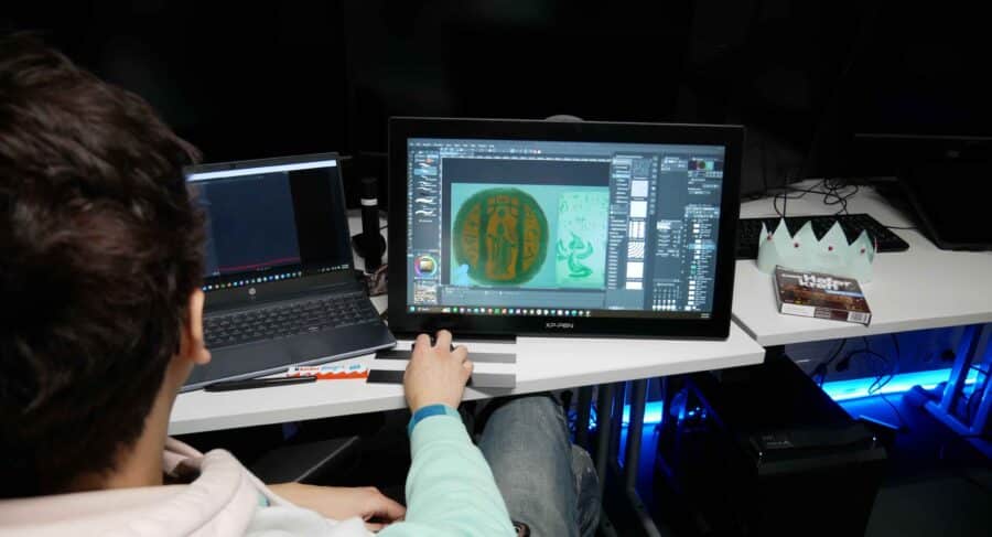 MetStudios student working on a game while at a desk