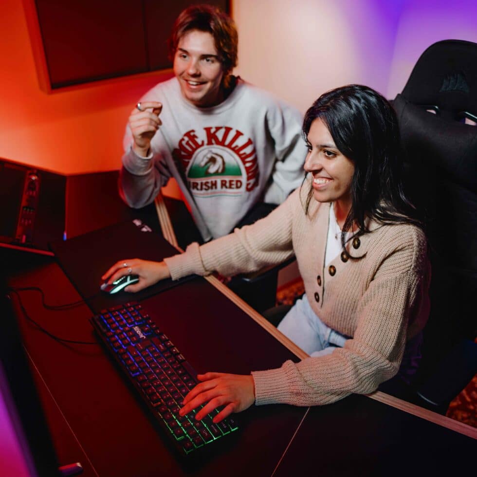 MetStudios students seated working at a desk